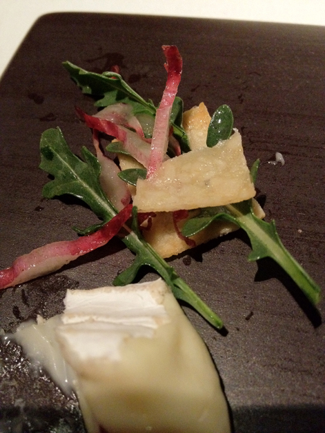 brie with endive leaves in pine nut wafers at moments mandarin hotel barcelona