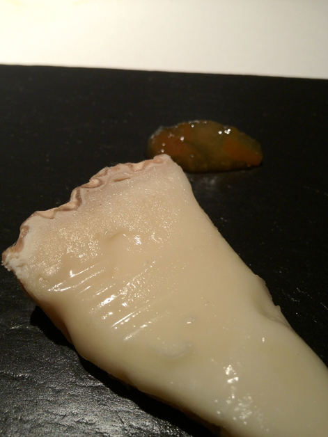 soft cow's milk cheese with bitter orange marmalade at Cinc Sentits soft cow's milk cheese with bitter orange marmalade at cinc sentits