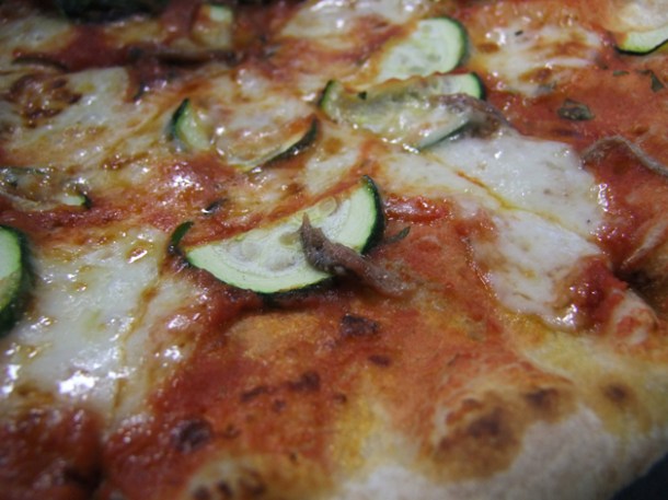 close up of anchovies and zucchini pizza pilgrims