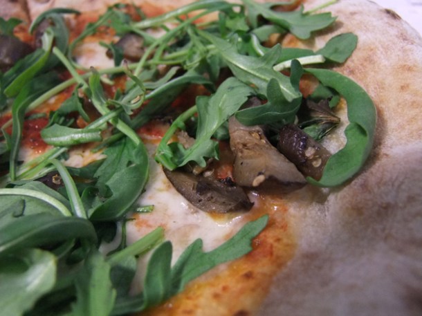 close up of eggplant and rocket pizza pilgrims