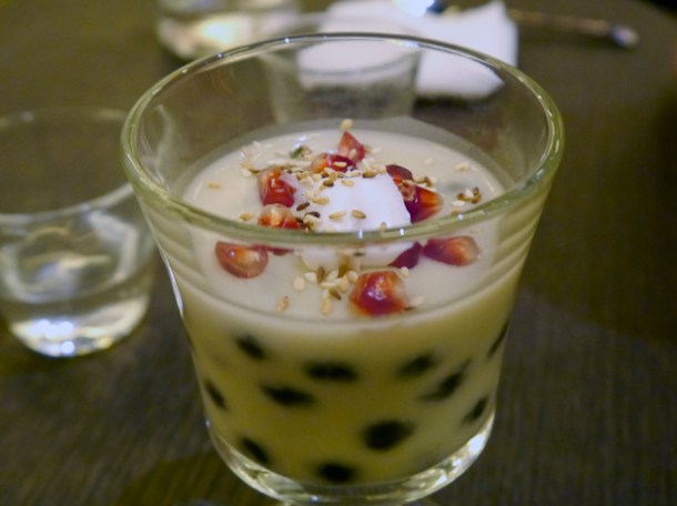 coconut pudding and tapioca pearl topped with sesame seeds and pomegranate at naamyaa cafe