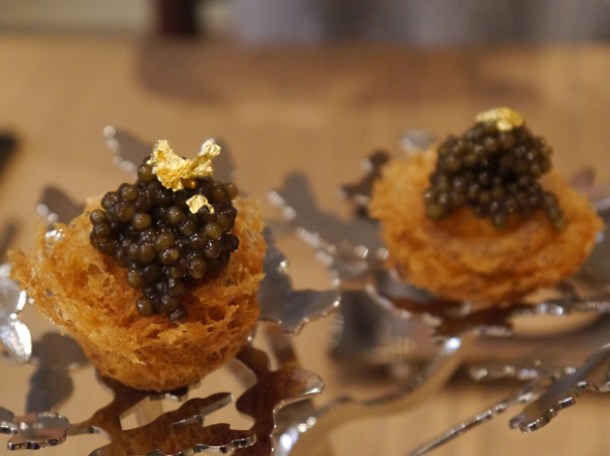 quail egg puff topped with caviar and gold leaf at bo london