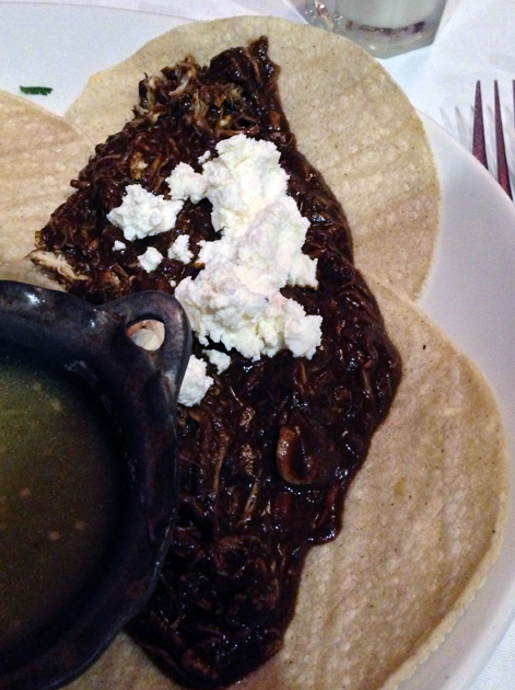 pollo con mole tacos at mestizo