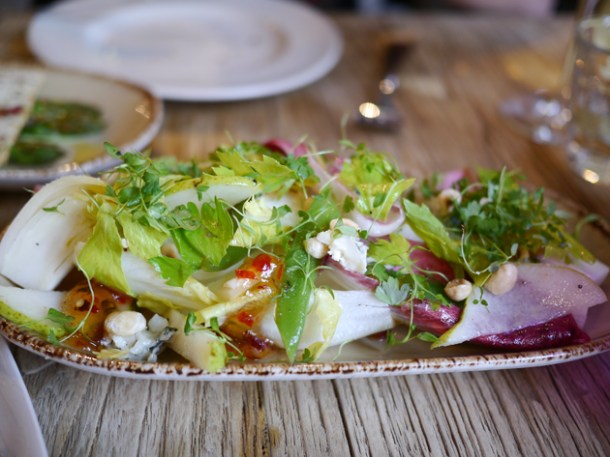 endive, pear, green bean and roquefort salad, smoked pepper jelly, toasted hazelnuts at grain store granary square