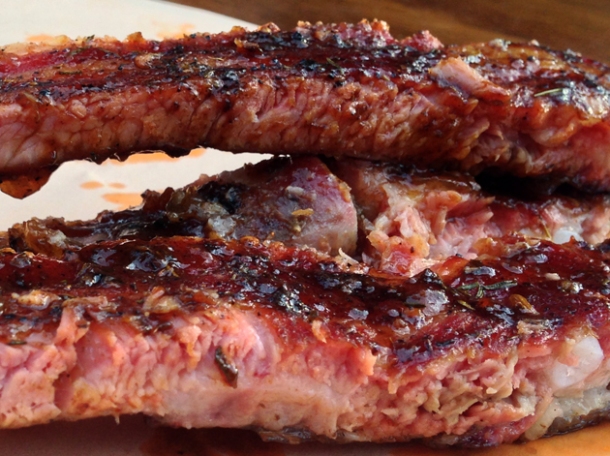 close up of st louis cut spare ribs from smokestak