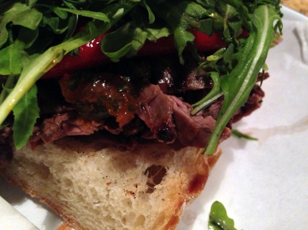 close up of steak sandwich at mamita que chorizo