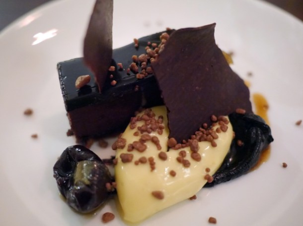 chocolate, prune and cardamom delice, bergamot cream and praline at oklava