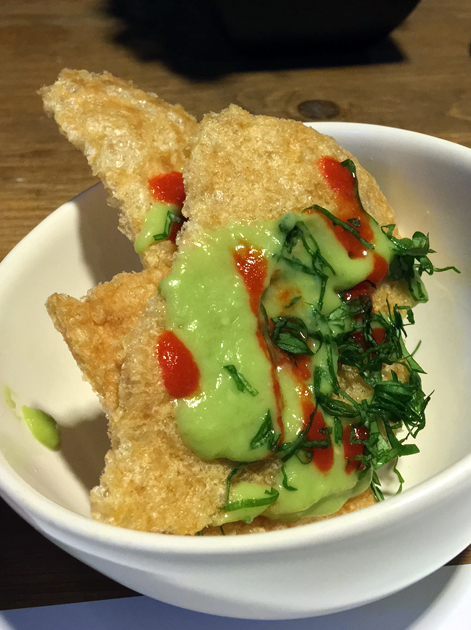 pork crackling with wasabi and sriracha sauce at nudo negro