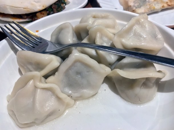 steamed pork and vegetable dumplings at xi'an impression