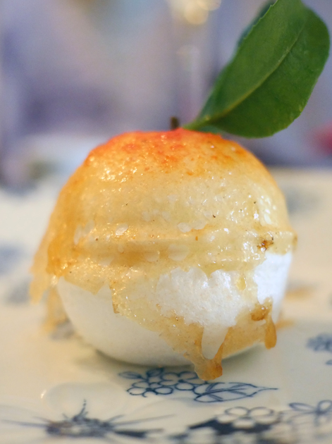 meringue filled with blood orange sorbet at a wong
