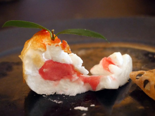 sliced meringue filled with blood orange sorbet at a wong victoria