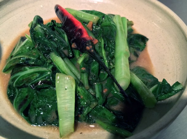 stir fried greens in soy sauce at kiln