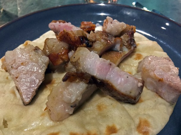 grilled and smoked pork at temper