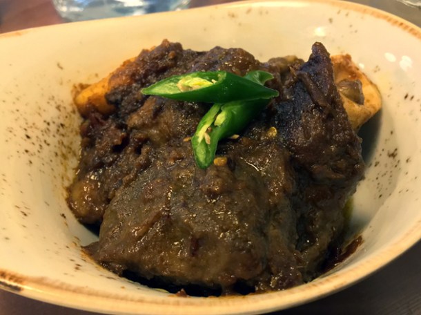 slow cooked goat at darjeeling express