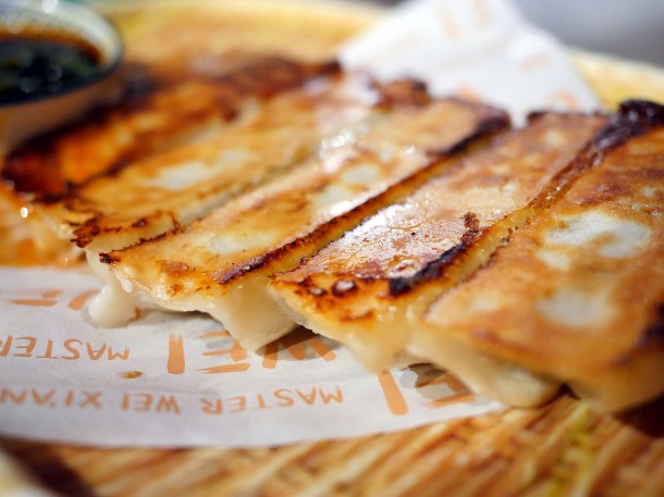 illustrative photo of the pork and seaweed dumplings at at Master Wei outdoors