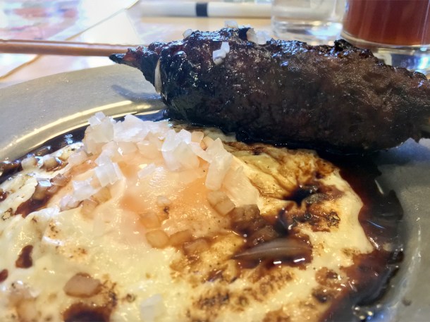 illustrative photo of the pork and beef meatball with fried egg at bao borough