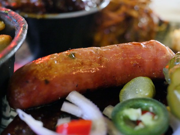 illustrative photo of the sausage at Red's True BBQ Manchester