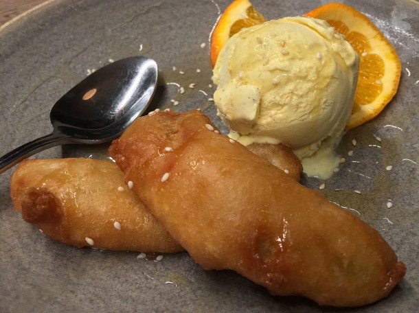 illustrative photo of the banana fritters with ice cream at Mc and Sons