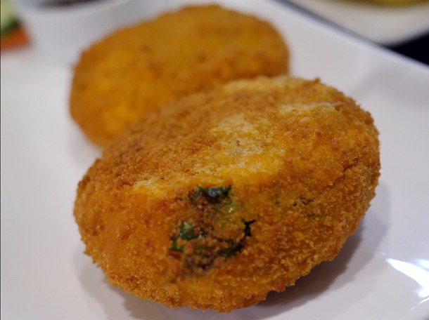 illustrative photo of the aloo chop at Maya DD's