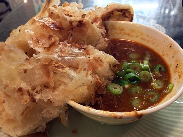 illustrative photo of the beef rendang with roti at Normah's Cafe