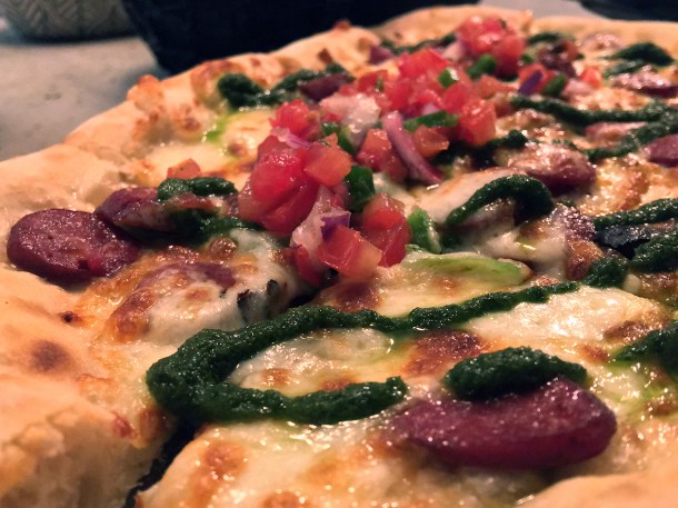 illustrative photo of the wagyu pizza at Madera Treehouse