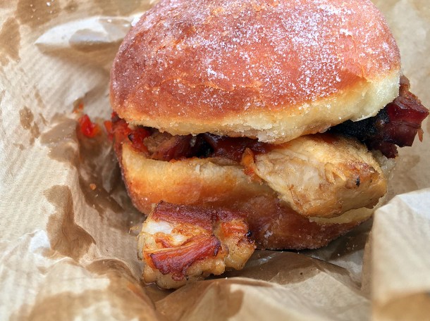 illustrative photo of the pork doughnut with chilli jam from From The Ashes BBQ.