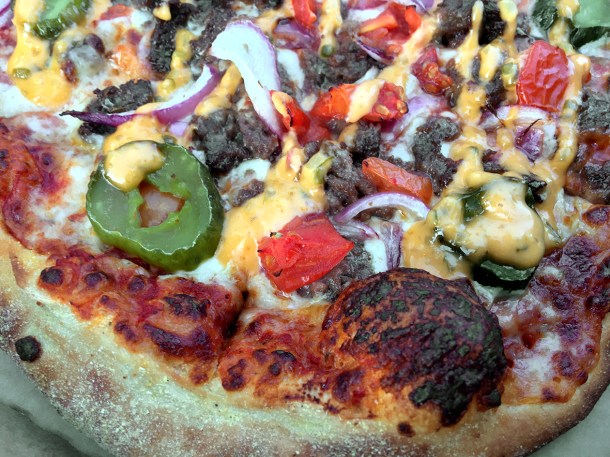 illustrative photo of the cheeseburger pizza from Domino's Elephant and Castle