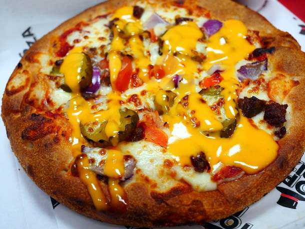 illustrative photo of the cheeseburger pizza from Tops Pizza