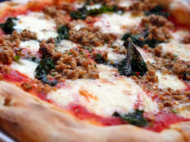 illustrative photo of the pork and fennel sausage and kale and chilli pizza from Caravan Bankside