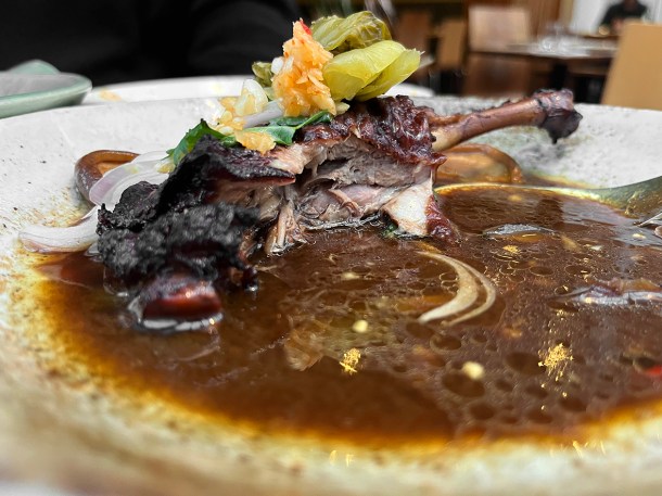 illustrative photo of the five spice duck leg at Begging Bowl