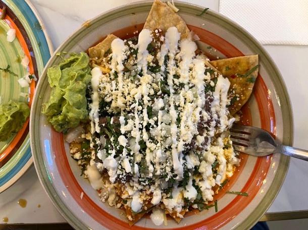 illustrative photo of the chilaquiles with tongue at Guacamoles