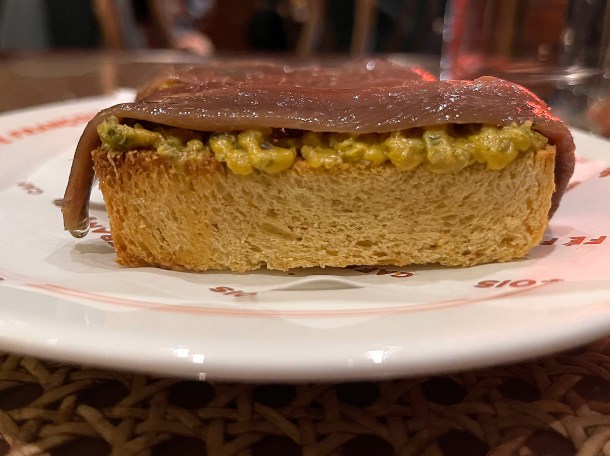 illustrative photo of the anchovies brioche with Cafe de Paris butter at Cafe Francois