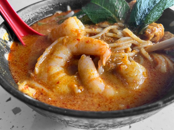 illustrative photo of the signature curry laksa noodle soup at Sambal Shiok