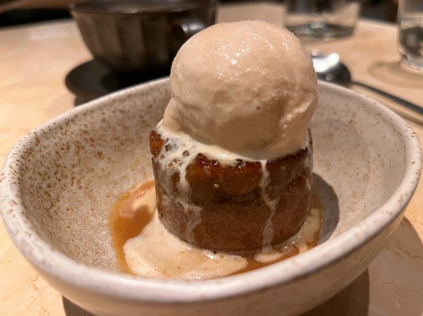 illustrative photo of the plantain cake with toasted milk ice cream and smoked butter sauce at Akara