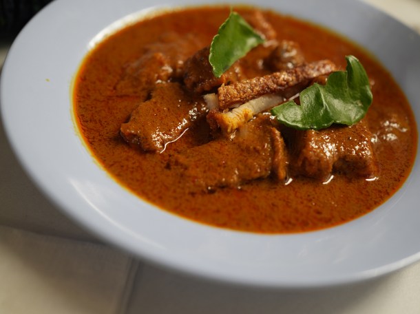 illustrative photo of the crispy pork and black pepper curry at Speedboat Bar Notting Hill