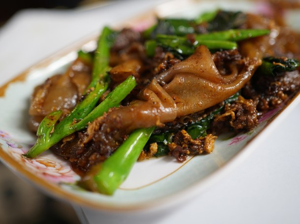 illustrative photo of the wide rice noodles with beef and soy sauce at Speedboat Bar Notting Hill