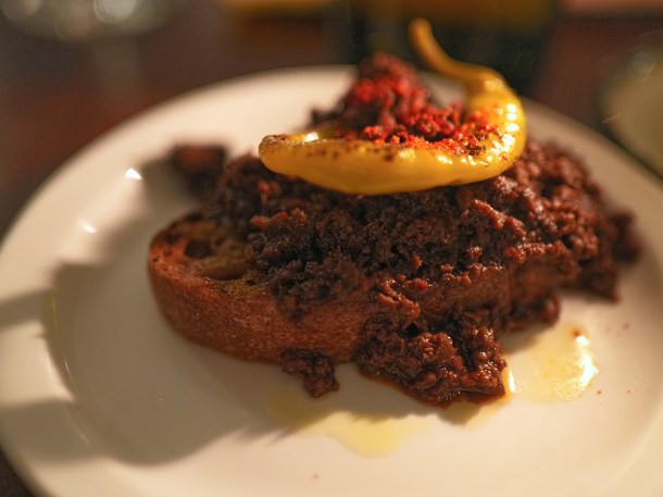 illustrative photo of the ox heart ragu on toast at Hausu